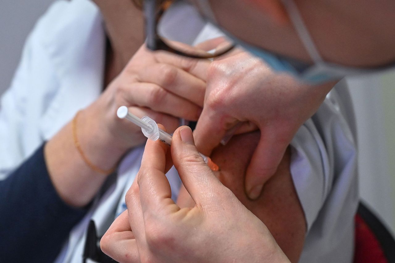 A doctor administers a dose of the Pfizer-BioNtech Covid-19 vaccine on January 5 at the University Hospital Centre of Lille, France. 