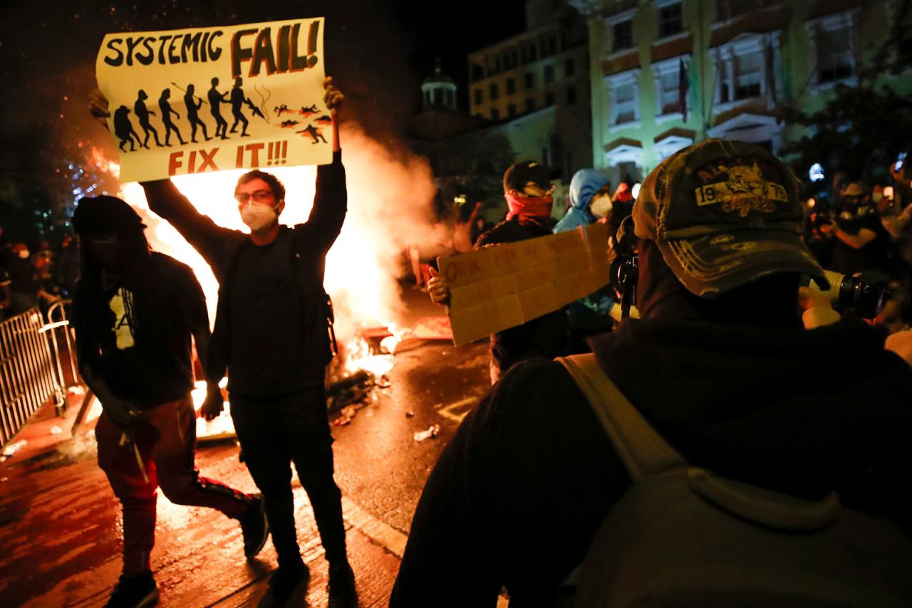 Demonstrators protest the death of George Floyd on May 31 near the White House in Washington. 