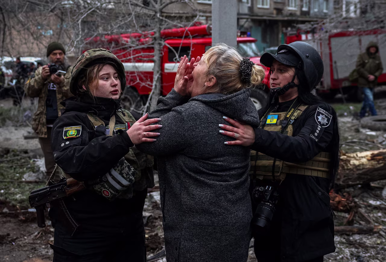 A woman reacts to an attack on a residential building in Sloviansk, Ukraine, on April 14. 