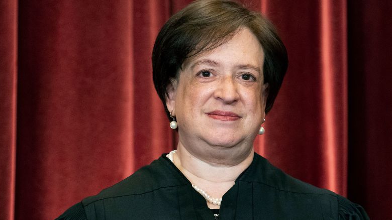 Justice Elena Kagan stands during a group photo at the Supreme Court in 2021. 