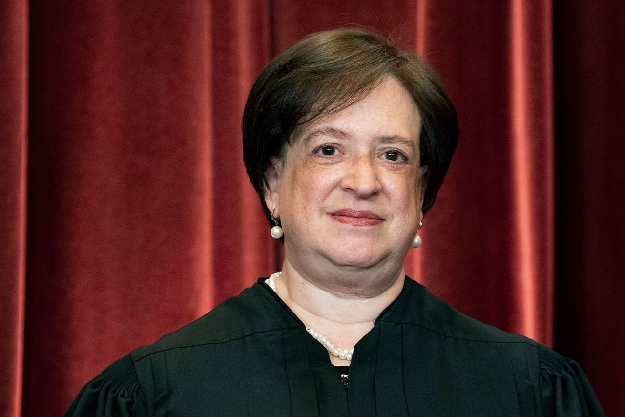 Justice Elena Kagan stands during a group photo at the Supreme Court in 2021. 