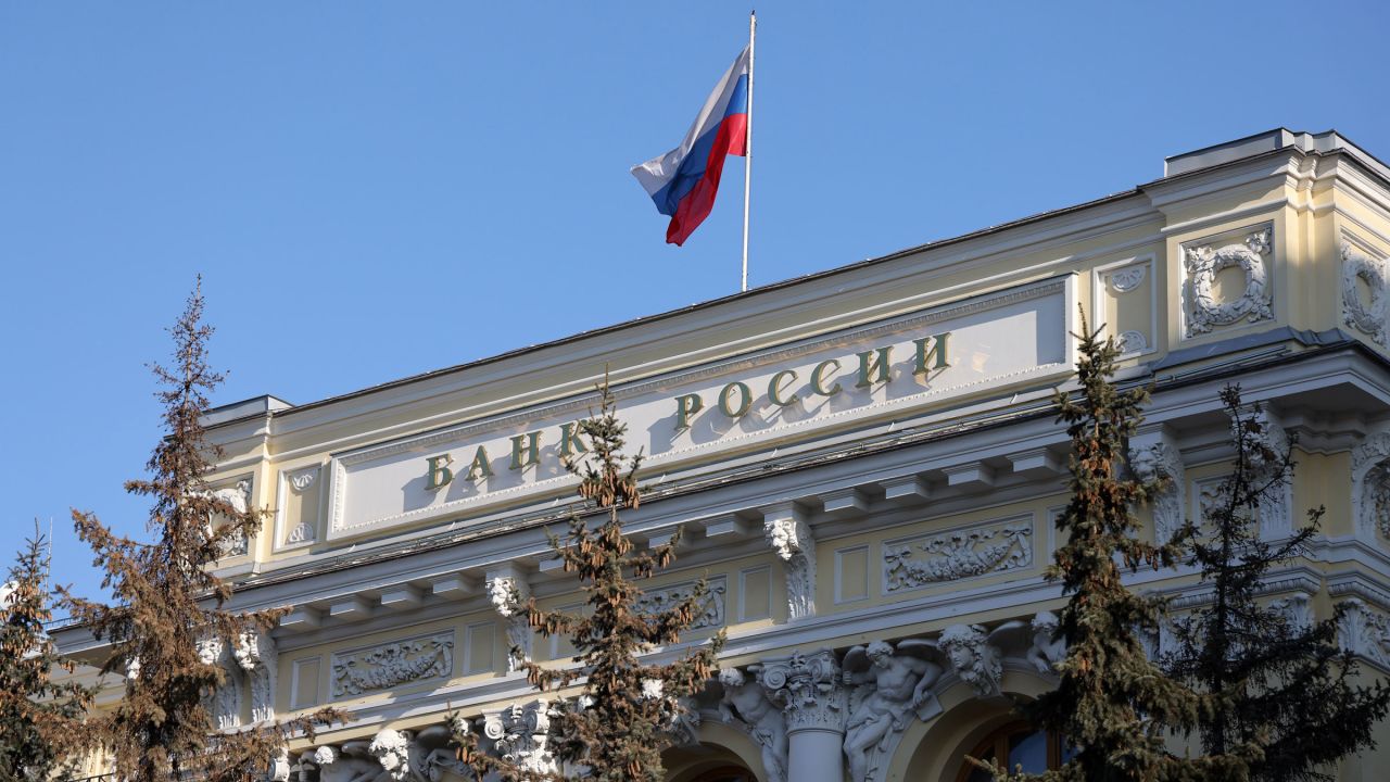 A Russian flag flies above the Moscow headquarters of Russia's central bank on Monday.