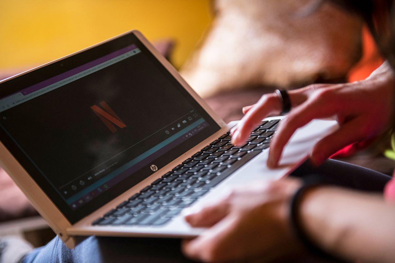 ?A woman watches a Netflix TV series on a laptop to pass the time after the Italian government clamped down on public events, closed bars, restaurants and schools, imposed travel restrictions and advised citizens to stay at home in an attempt to slow the spread of the Coronavirus on March 15, in Turin, Italy. 