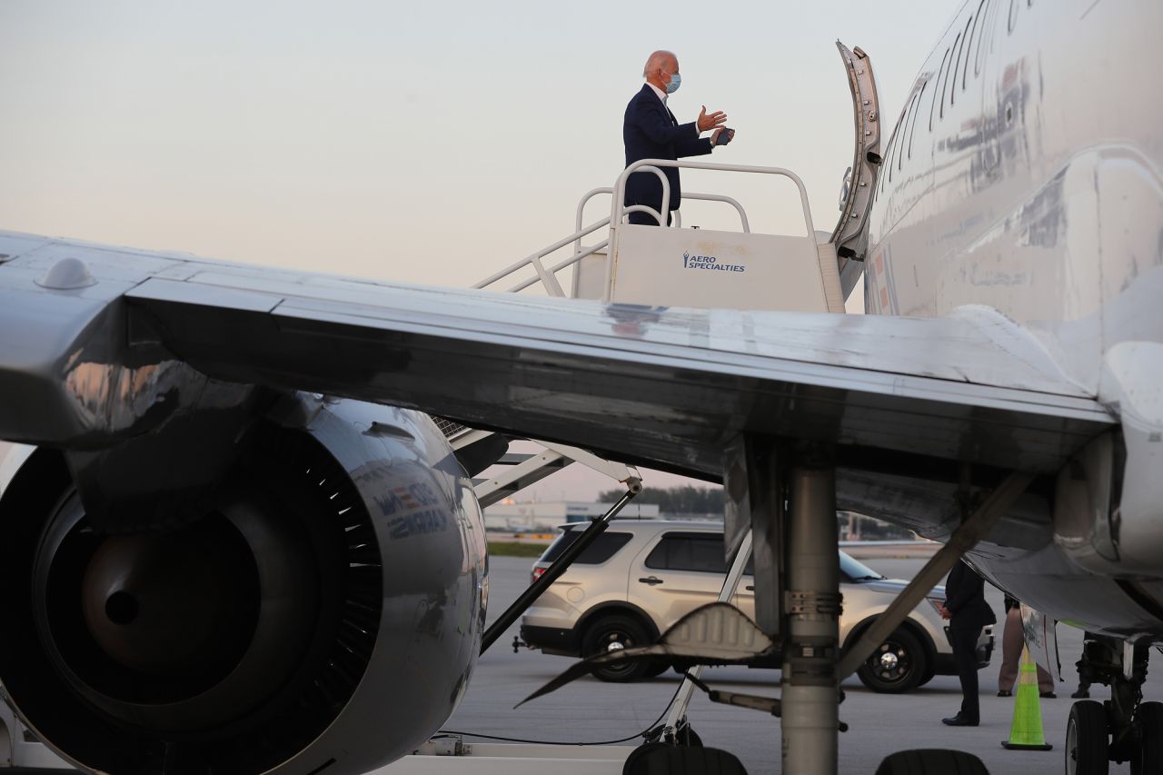 Democratic presidential candidate Joe Biden boards his campaign plane at Fort Lauderdale-Hollywood International Airport October 13 in Fort Lauderdale, Florida.