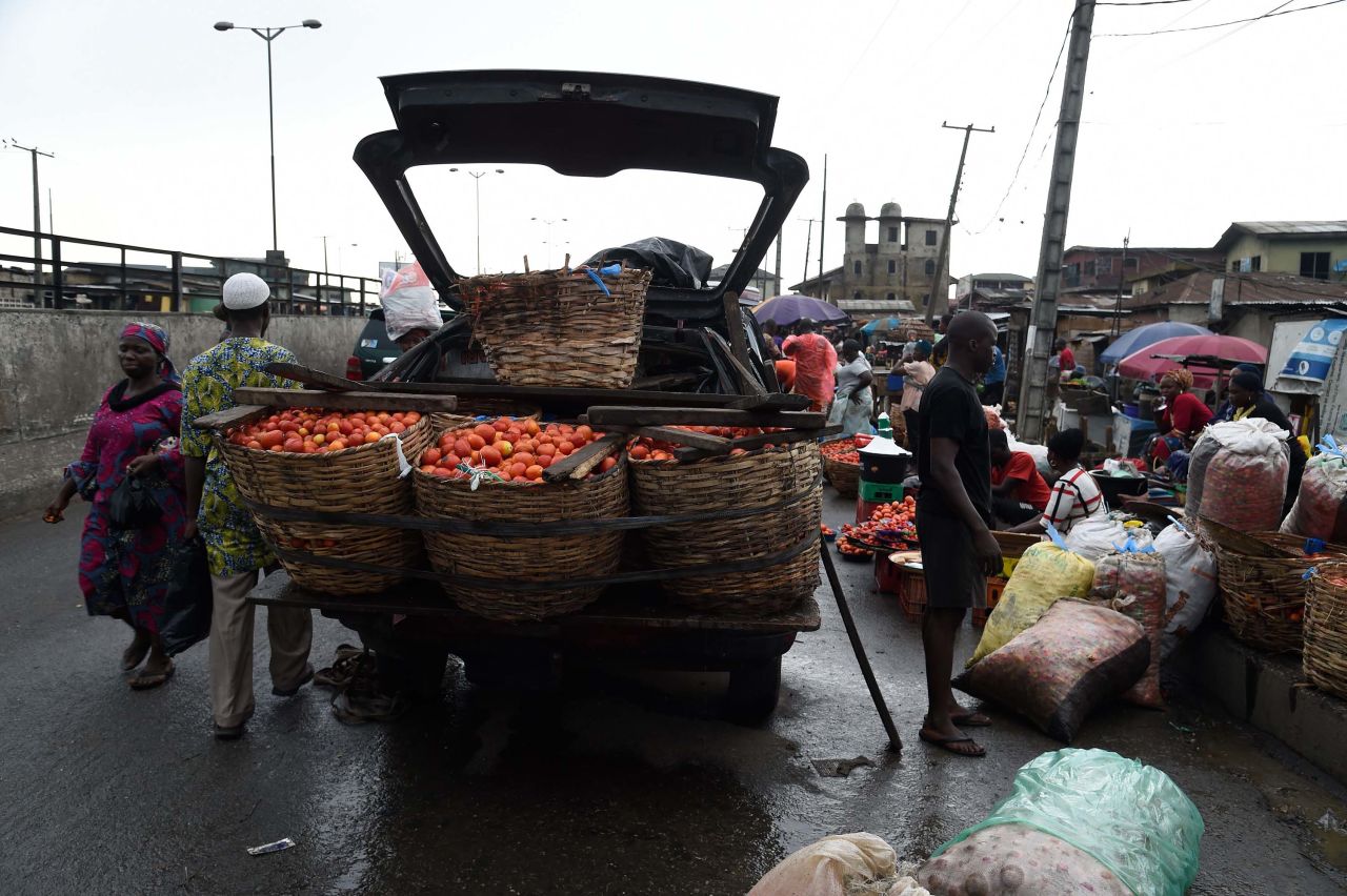 Vendors sell food at a market in Lagos, Nigeria, on April 6.