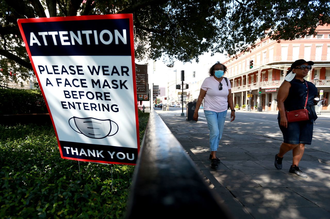 A sign in New Orleans asks people to wear a mask, in this photo taken in July.