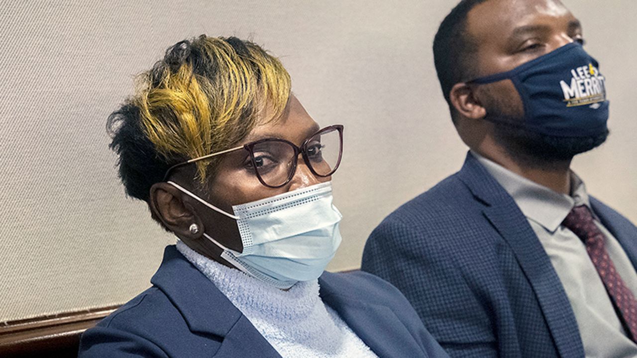 Ahmaud Arbery's mother Wanda Cooper-Jones, left, along with her attorney Lee Merritt, listens to William "Roddie" Bryan's defense attorney Kevin Gough present his closing statement to the jury, Monday, November 22.