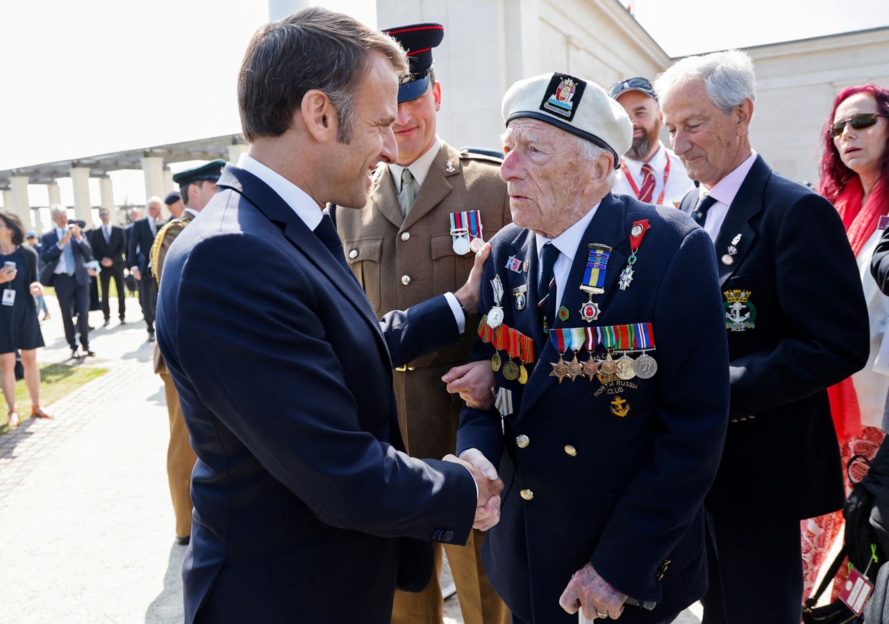 France's President Emmanuel Macron greets 98-year-old British D-Day veteran Alec Penstone during the 80th anniversary of the World War II Allied landings in Normandy, France, on June 6.
