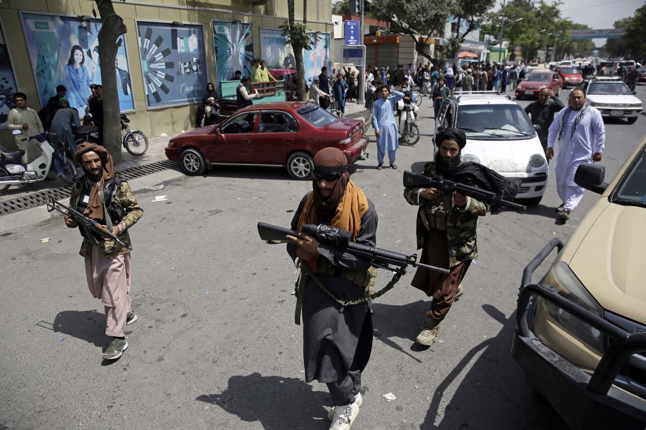 Taliban fighters patrol in Kabul, Afghanistan, on Thursday, August 19. 