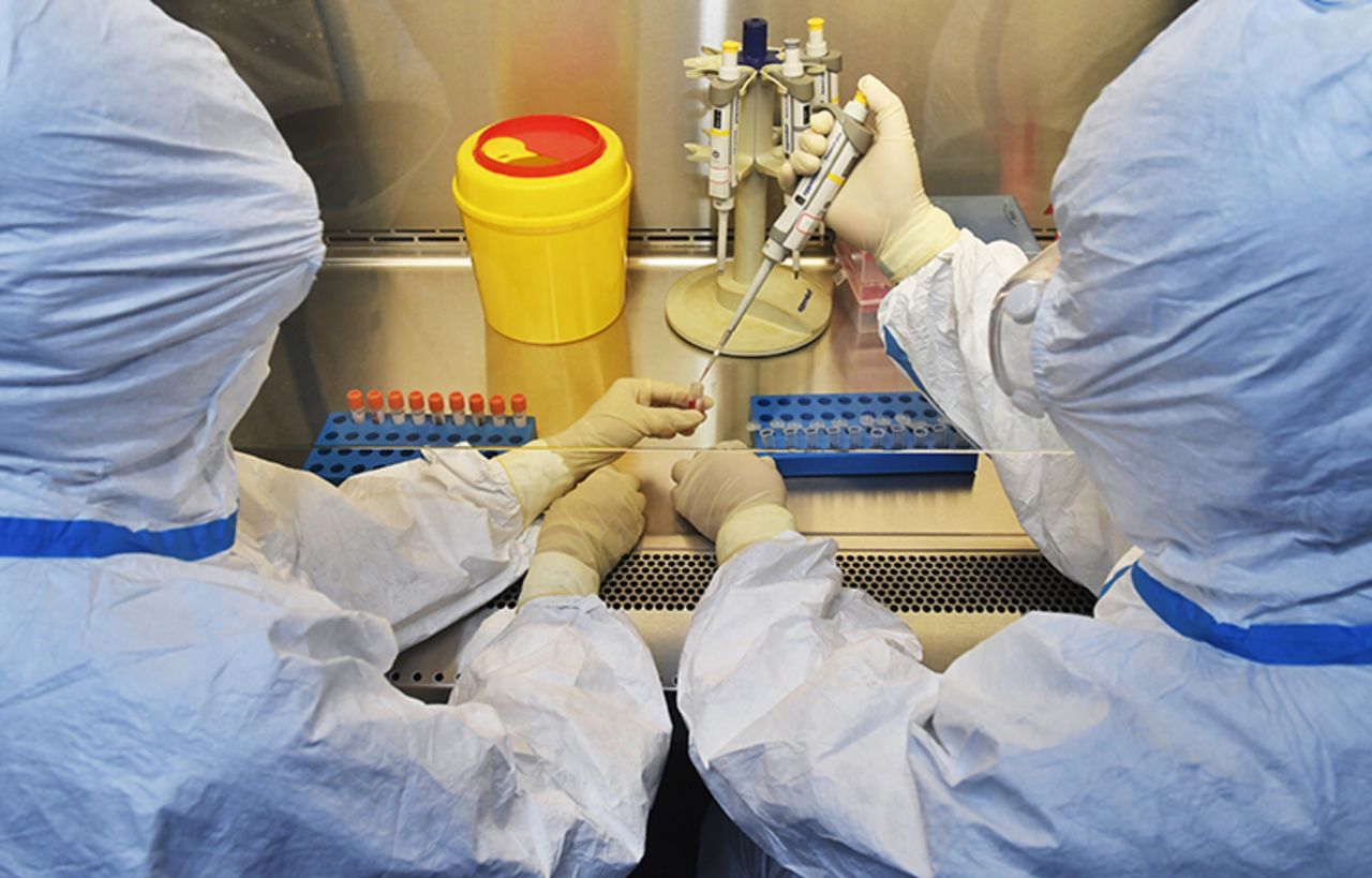 Staff members work at a laboratory in Chengdu, in southwest China's Sichuan province, on Saturday, February 15.