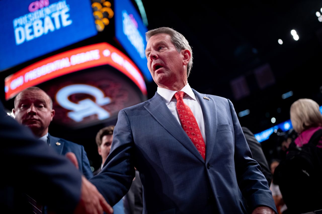 Brian Kemp walks through the CNN spin room ahead of a CNN Presidential Debate in Atlanta, Georgia, on June 27.