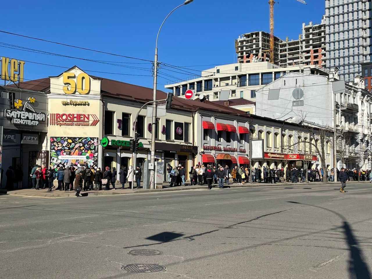 People joined lines to buy provisions in Kyiv after restrictions on staying at home ended Monday.