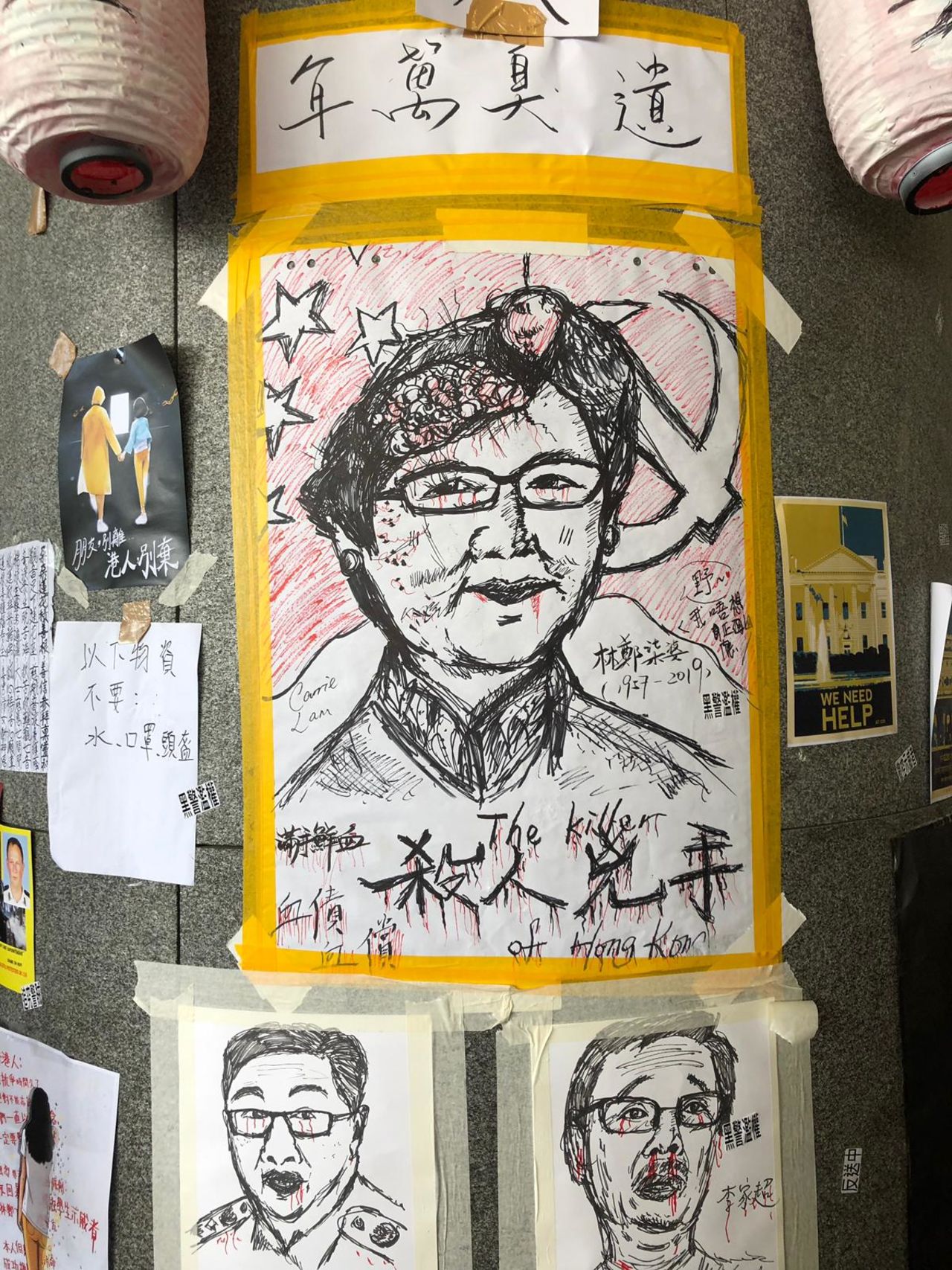 Posters near Hong Kong's government headquarters satirize city officials, including Chief Executive Carrie Lam.