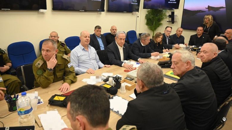 This handout photo shows the Israeli war cabinet, chaired by Prime Minister Benjamin Netanyahu, center, holding a meeting in Tel Aviv, Israel, on April 14. Portions of this photo have been blurred by the source.