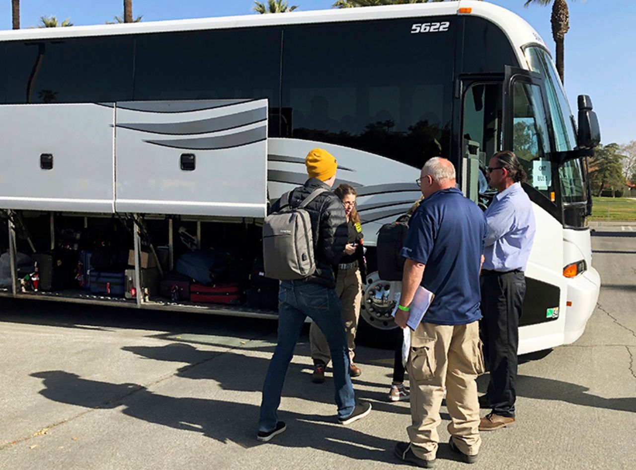 Evacuees are seen preparing to leave March Air Reserve Base in Riverside, California, on Tuesday, February 11, in this photo provided by Riverside University Public Health. 