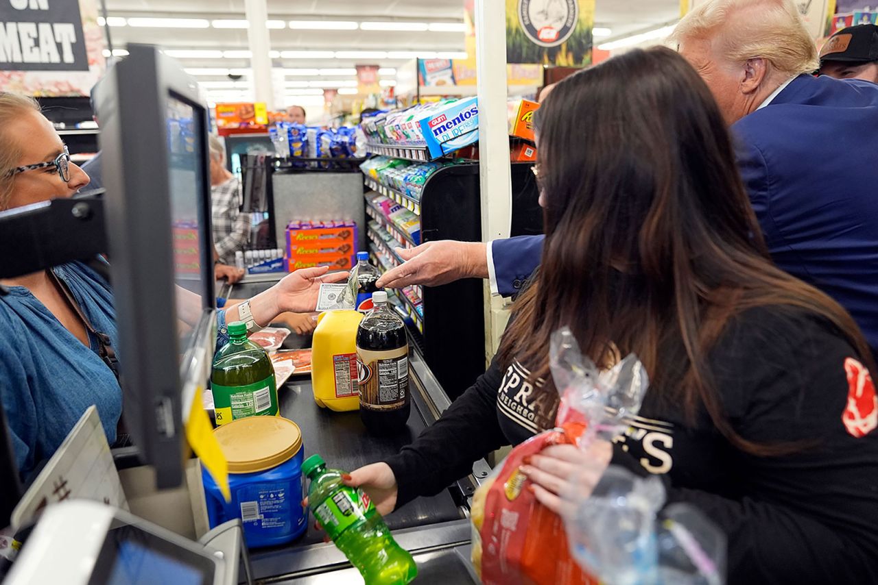 Trump gives a customer $100 for groceries as he visits Sprankle's Neighborhood Market.