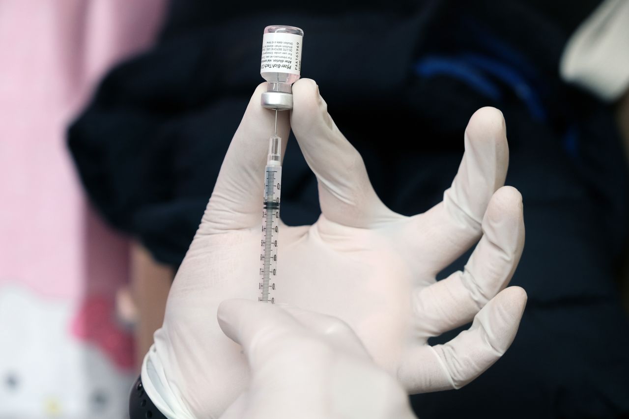 A pharmacist prepares the Pfizer Covid-19 vaccine in New York on March 26.