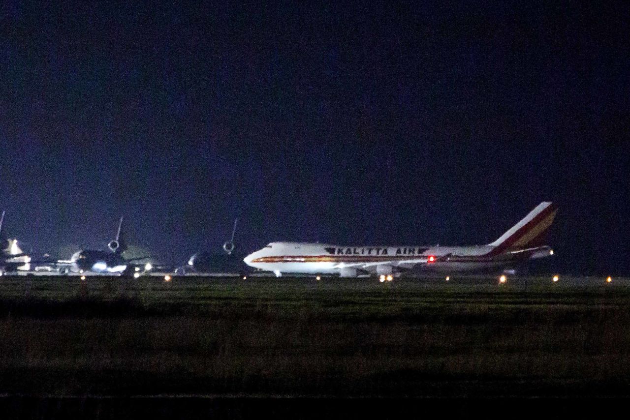 A plane carrying American passengers, who were released from quarantine aboard the Diamond Princess cruise ship in Japan, arrives at Travis Air Force Base in California on February 16.