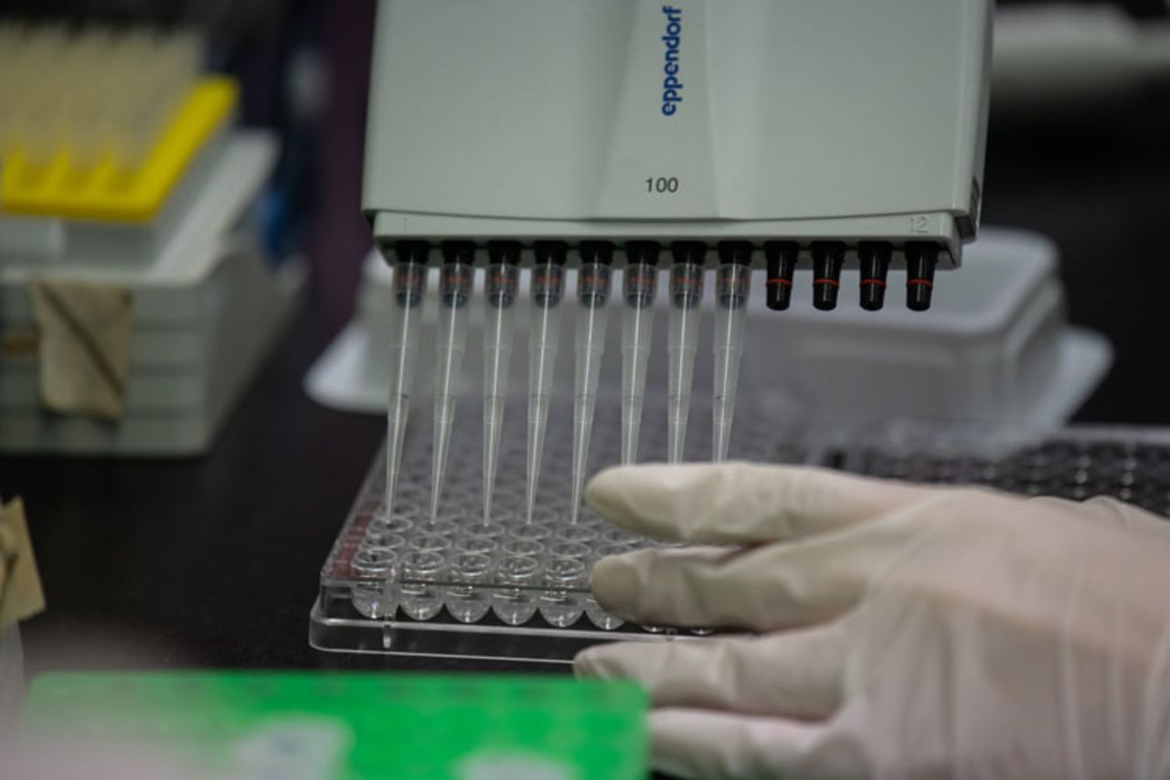 A lab technician works with testing equipment at a Bio Safety Level 3 laboratory at the International Vaccine Institute in Seoul, South Korea, on March 11. 