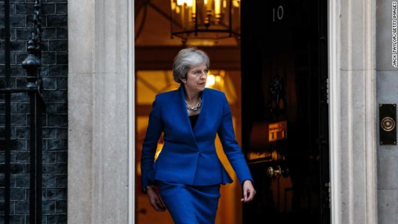 UK Prime Minister Theresa May is pictured stepping out of 10 Downing Street, October 24.