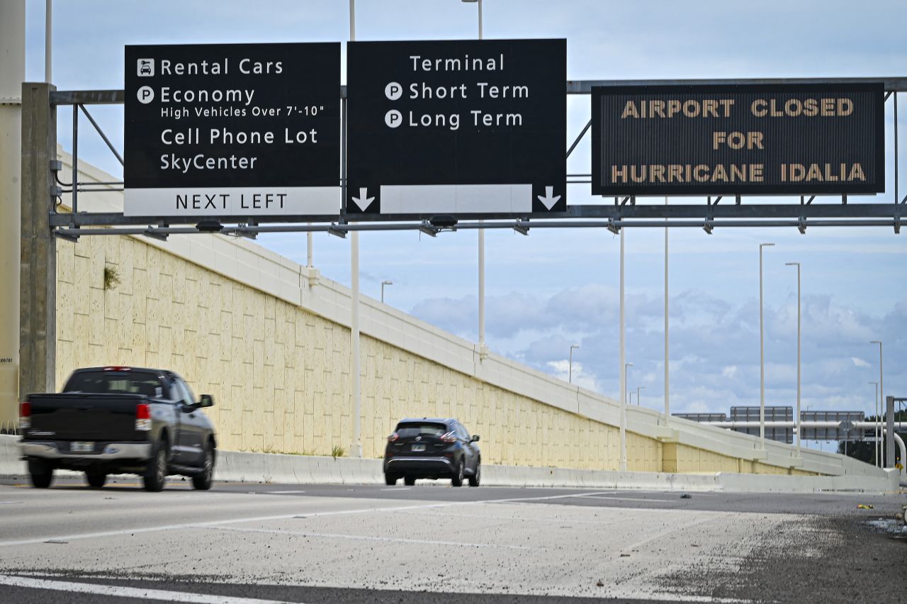 A sign informs travelers that Tampa International Airport is closed in Tampa, Florida, on August 29.