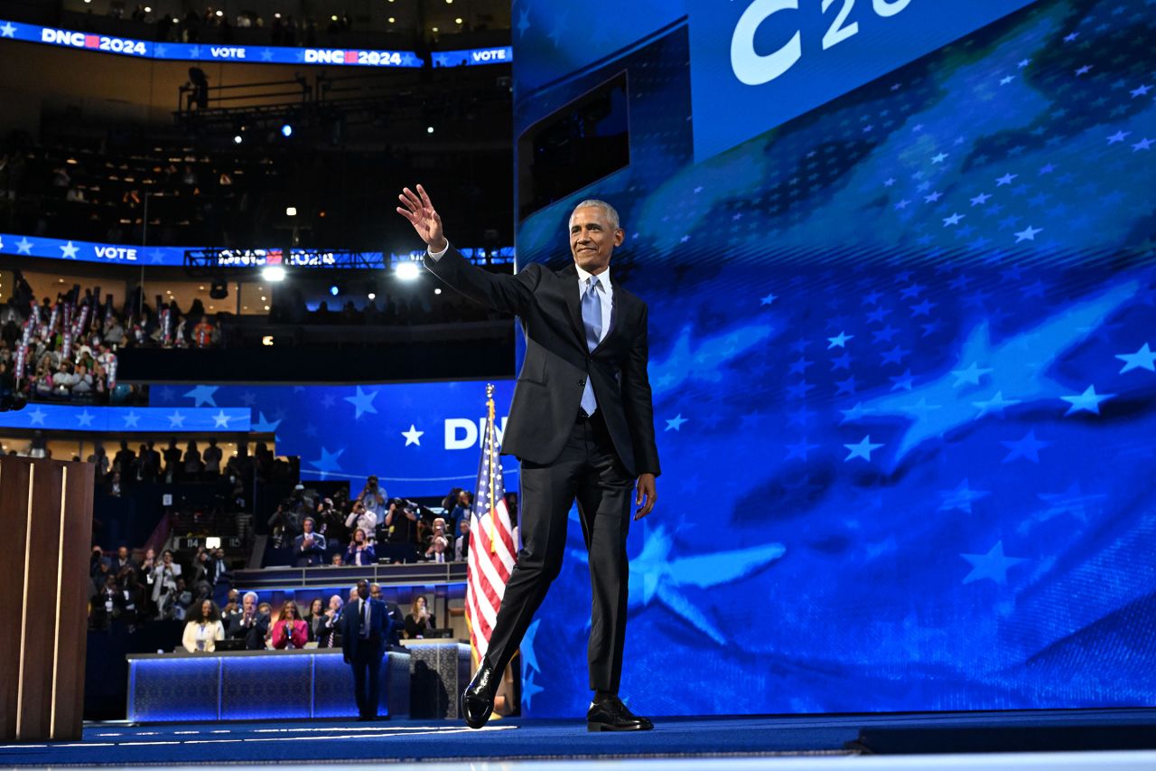 Former President Barack Obama walks onstage at the United Center during the Democratic National Convention in Chicago, on August 20. 