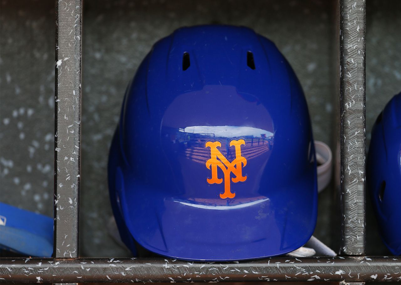 A New York Mets batting helmet in the dugout before a spring training baseball game at Clover Park on March 8, in Port St. Lucie, Florida. 