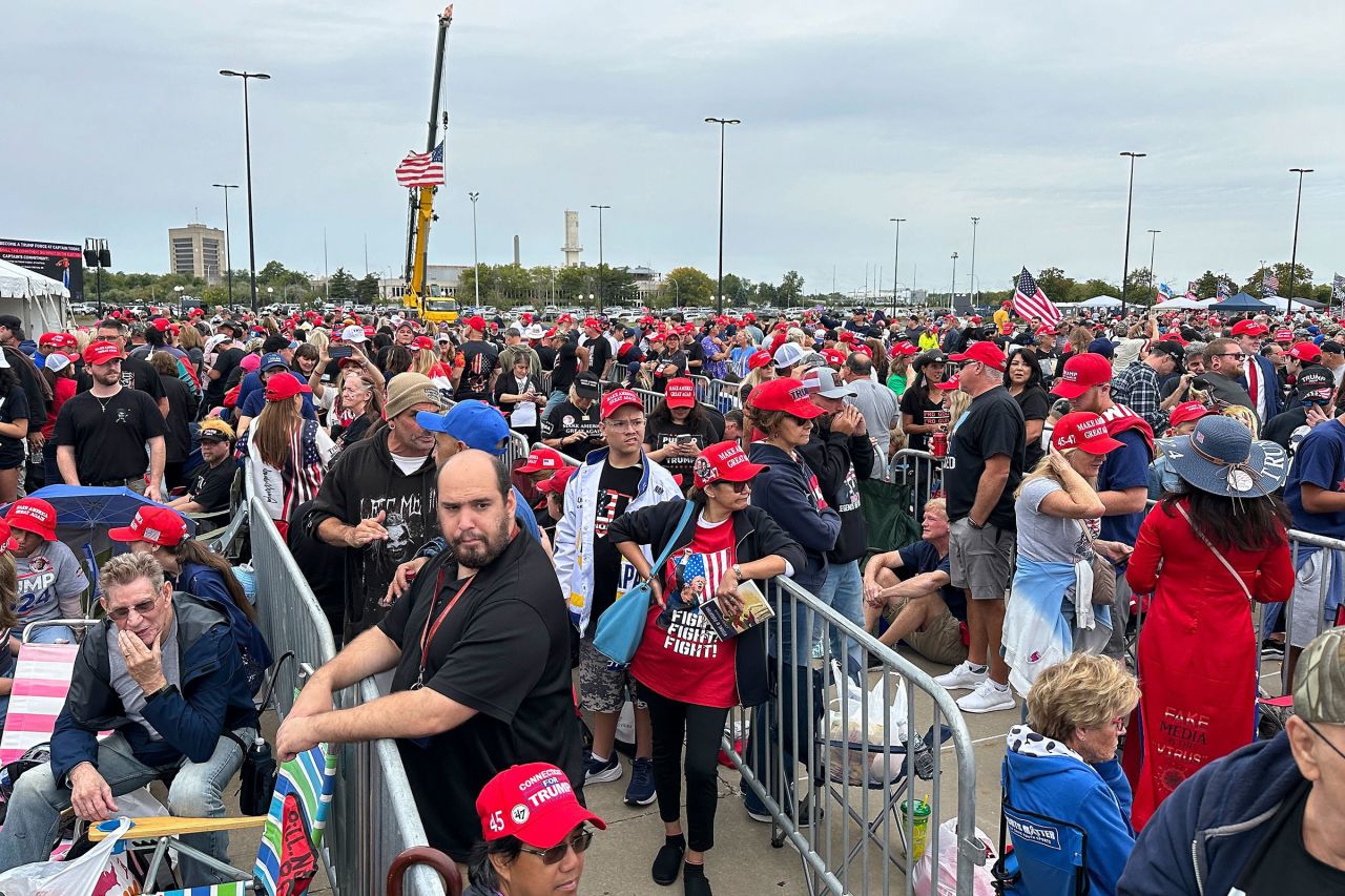 People wait outside Nassau Coliseum before the start of a rally for former President Donald Trump on September 18 in Uniondale, New York.