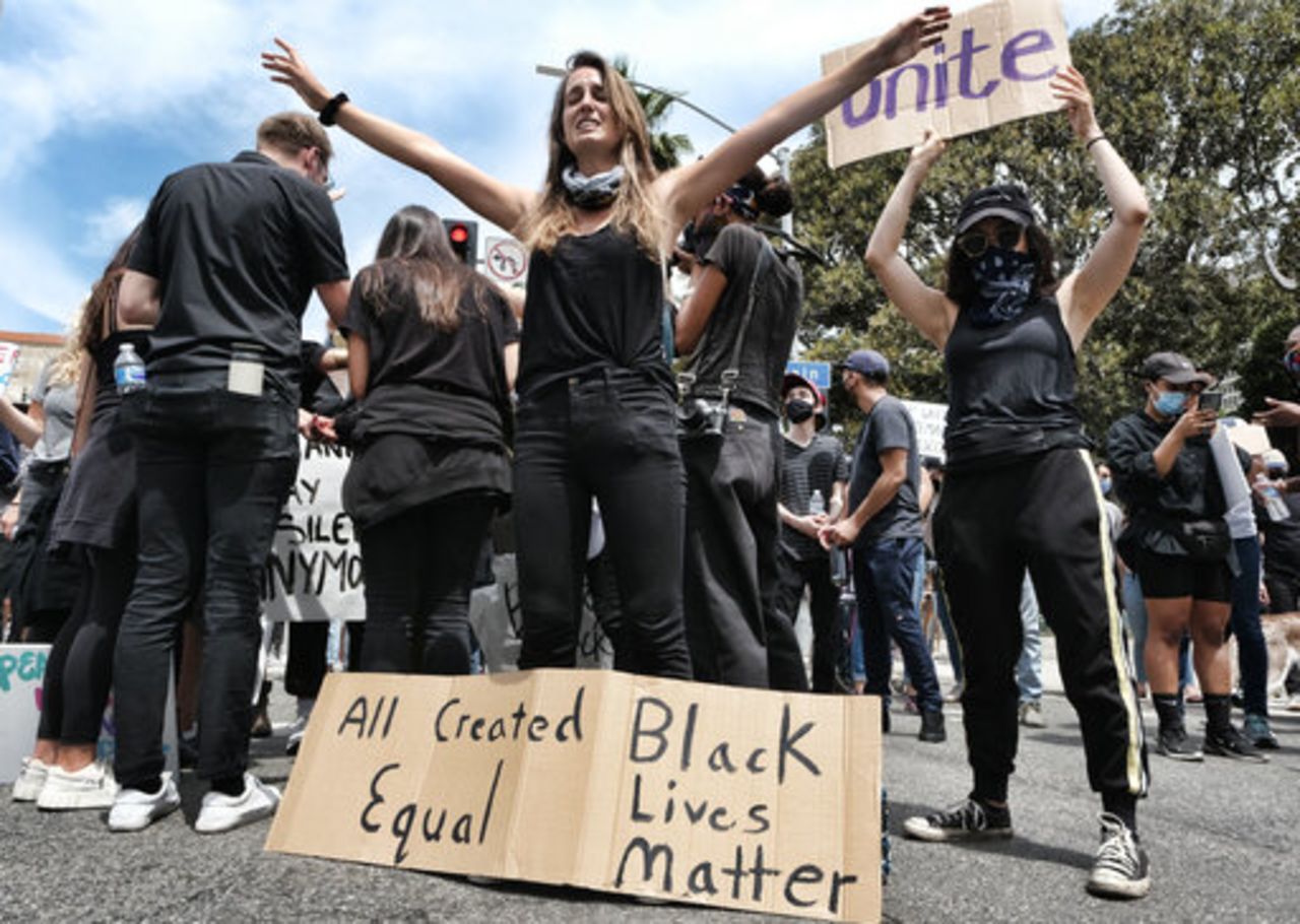 A protester cries during a Black Lives Matter protest in downtown Los Angeles on June 2 over the death of George Floyd.