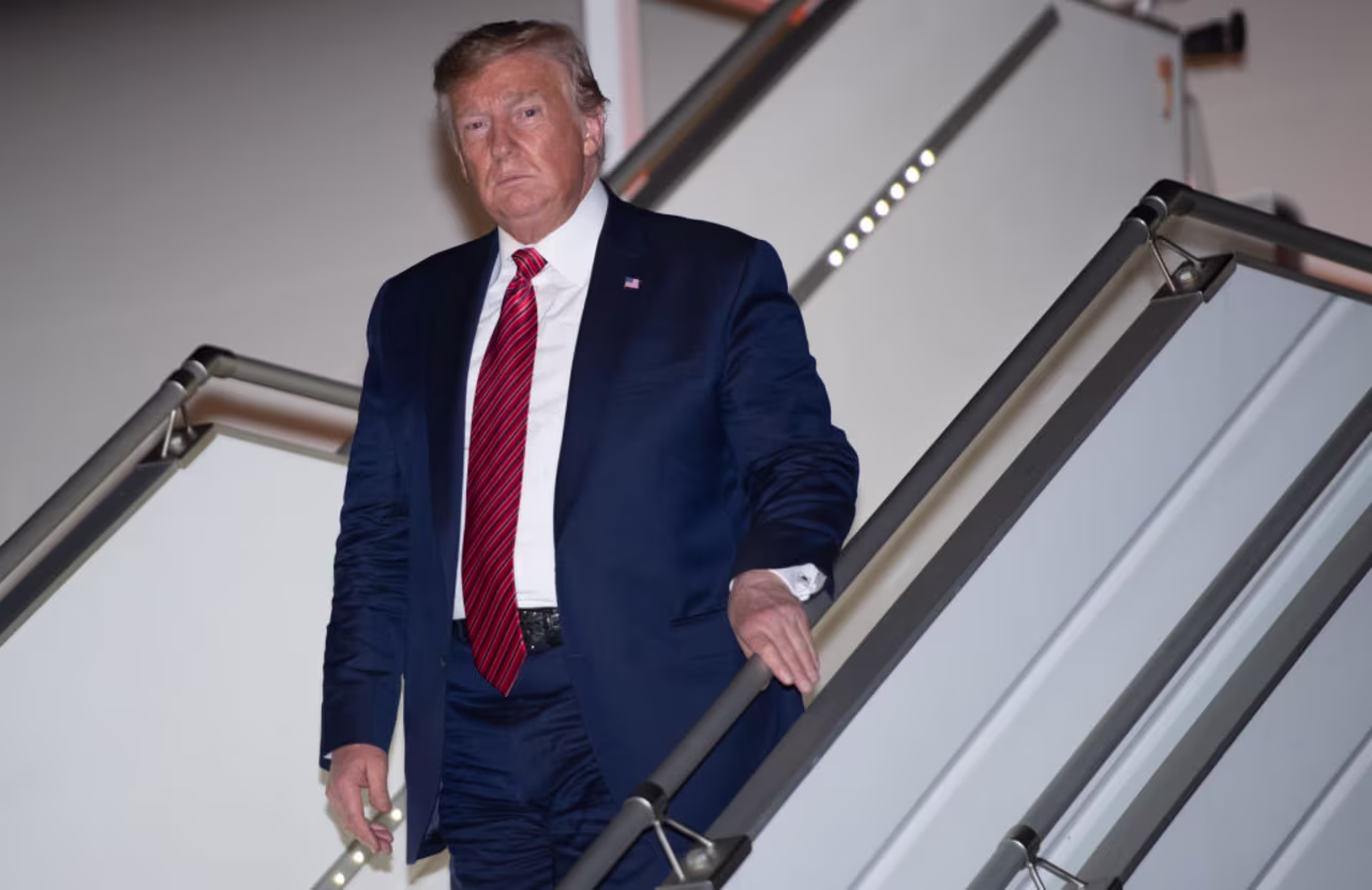 Trump disembarks from Air Force One upon arrival at John F. Kennedy International Airport in New York, September 22, 2019, as he arrives for the United Nations General Assembly.