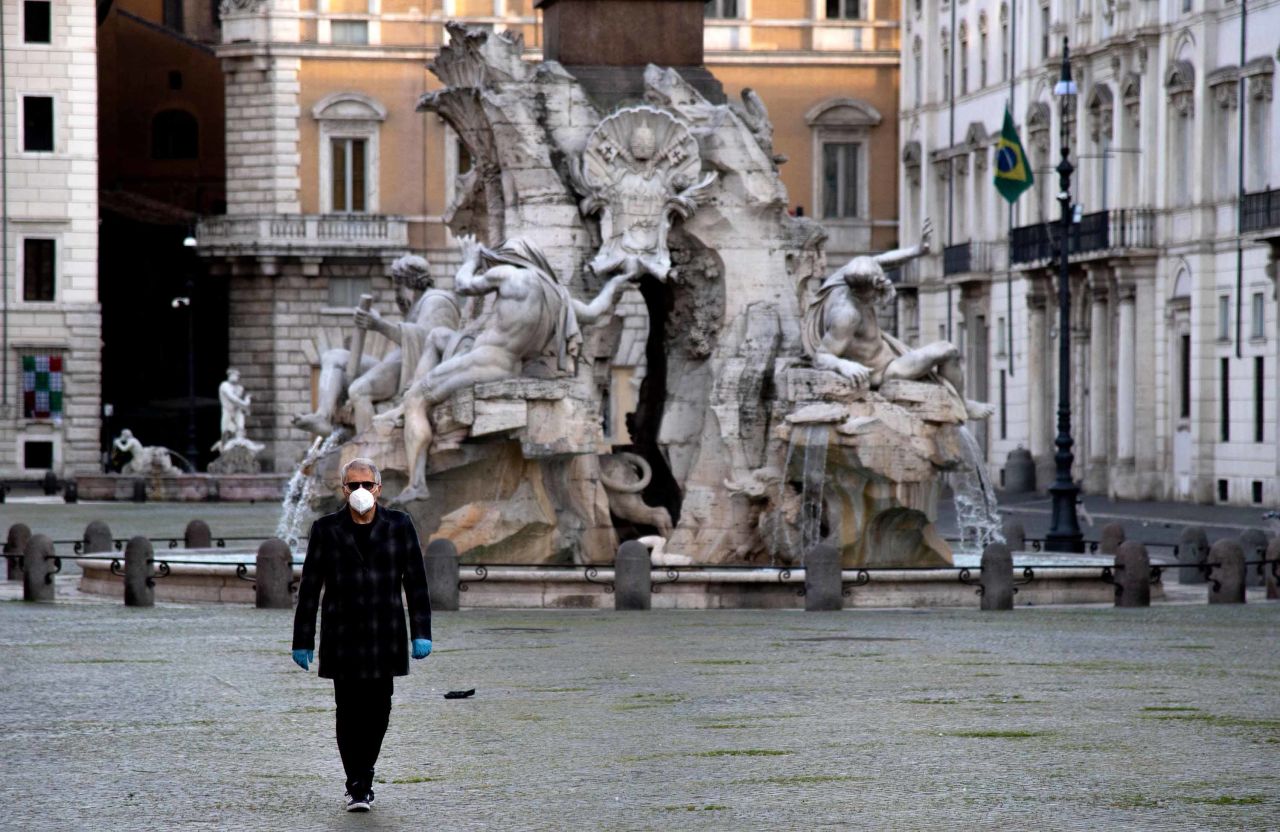 A man walks in Piazza Navona in Rome on April 16.