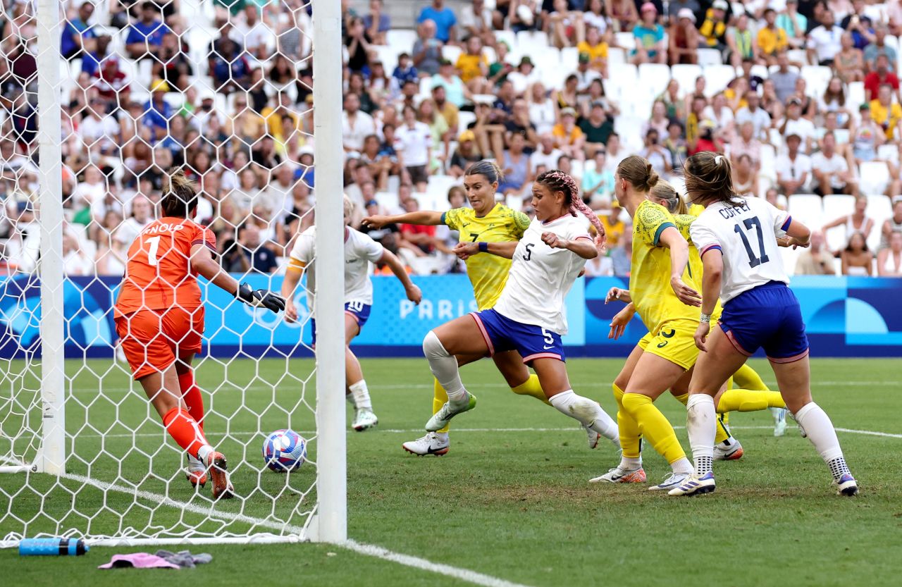 Trinity Rodman of the United States, center, scores a goal against Australia on Wednesday.