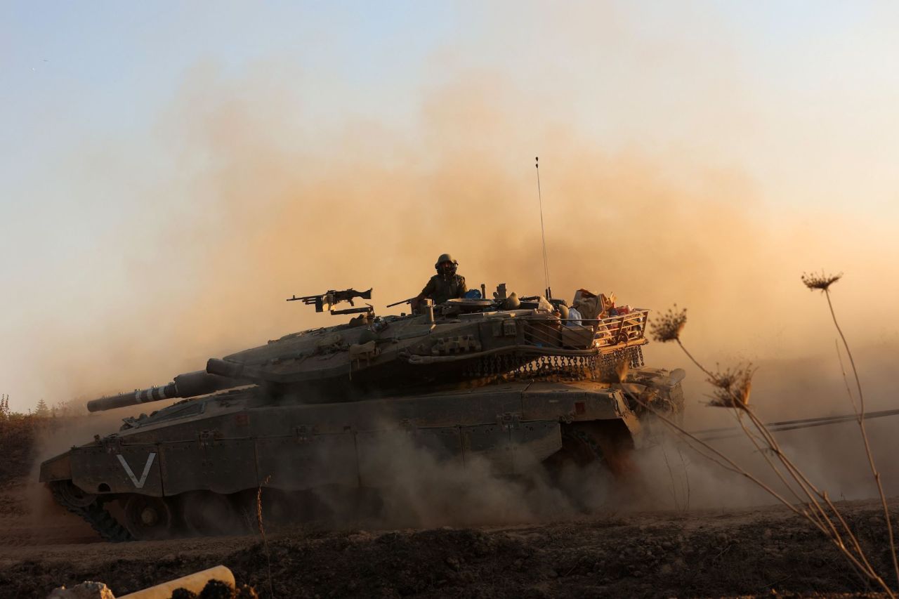 An Israeli tank moves along the border with Gaza on Wednesday.