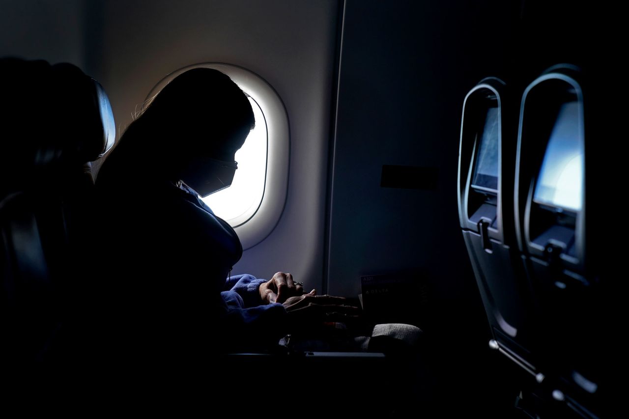 A passenger travels on a Delta Air Lines flight from Hartsfield-Jackson International Airport in Atlanta on February 3.