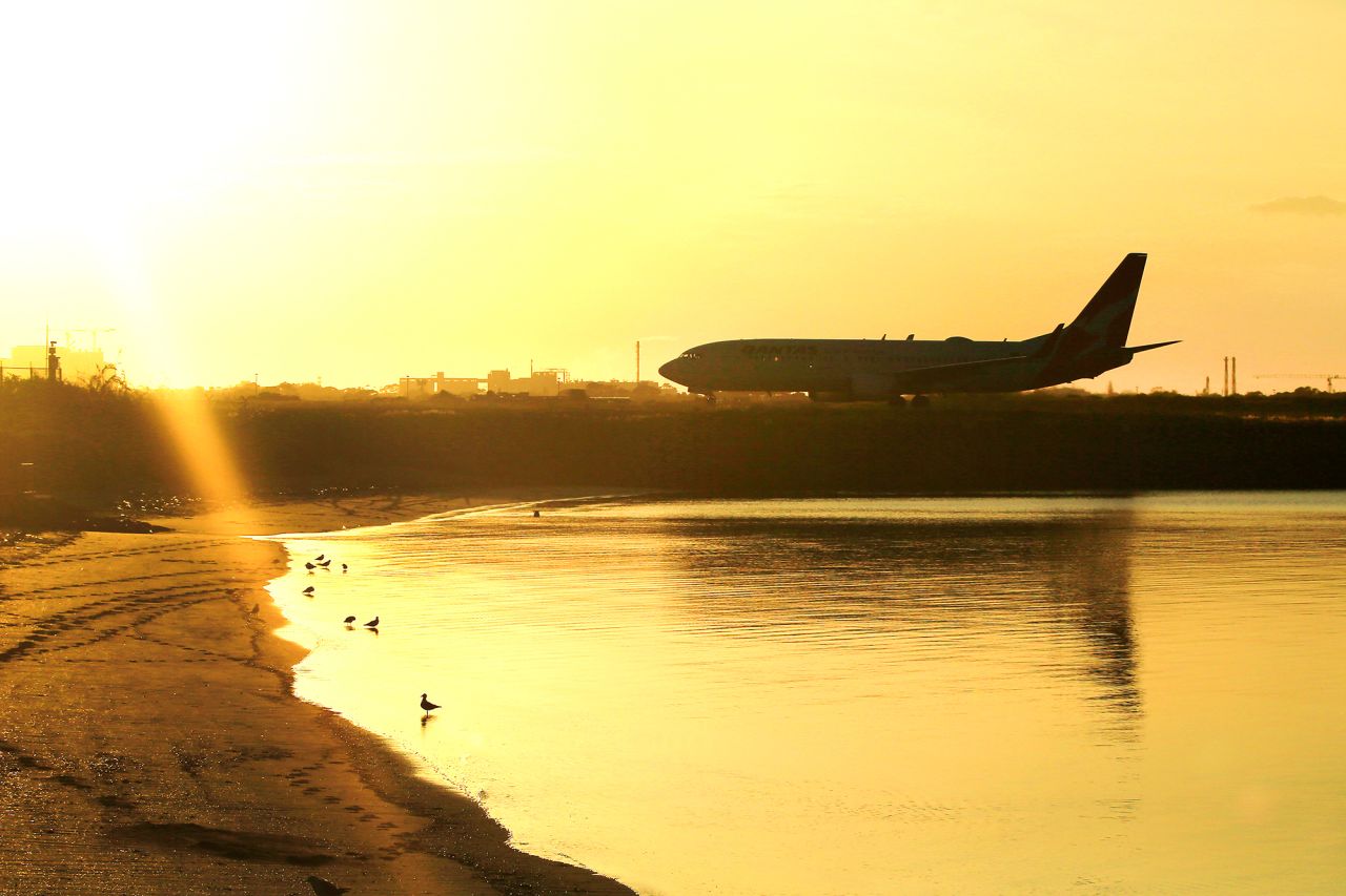 A Qantas jet lands at Sydney airport on March 25 in Australia. 