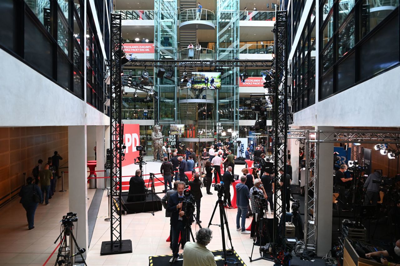Members of the media start to gather at the SPD party headquarters in Berlin.