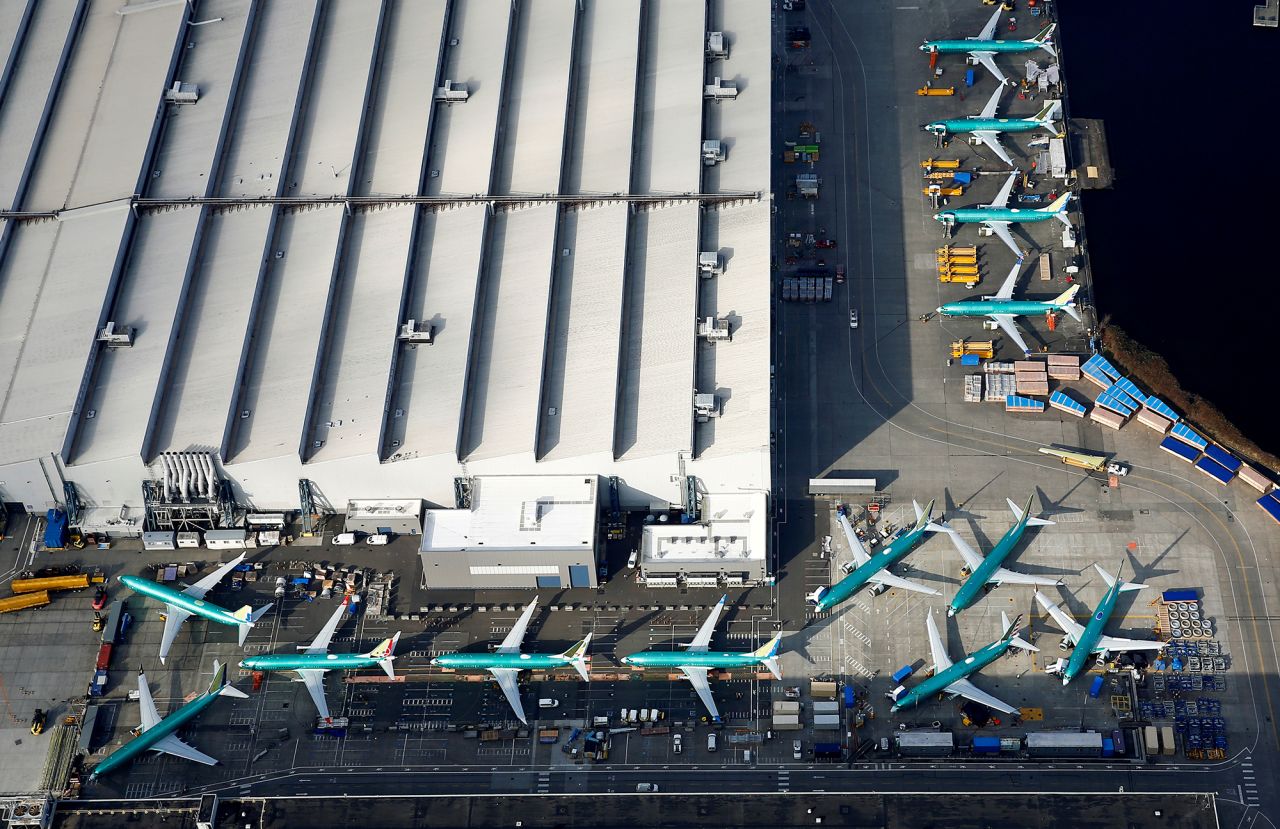 An aerial photo shows Boeing 737 MAX airplanes parked on the tarmac at the Boeing Factory in Renton, Washington, on March 21, 2019. 