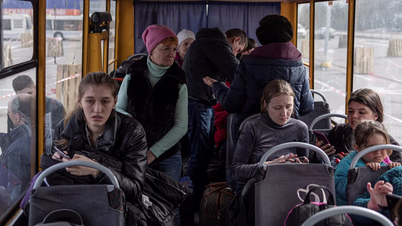 Evacuees from the Mariupol region arrive at reception center in Zaporizhzhia, Ukraine on March 31.