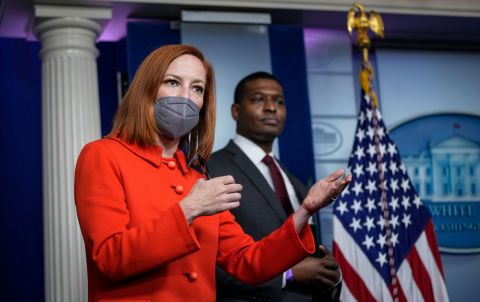 White House Press Secretary Jen Psaki speaks as Administrator of the Environmental Protection Agency Michael Regan looks on during the daily press briefing at the White House on May 12 in Washington, DC. 
