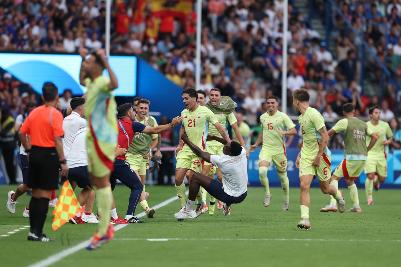 Spain celebrates the team's fourth goal.