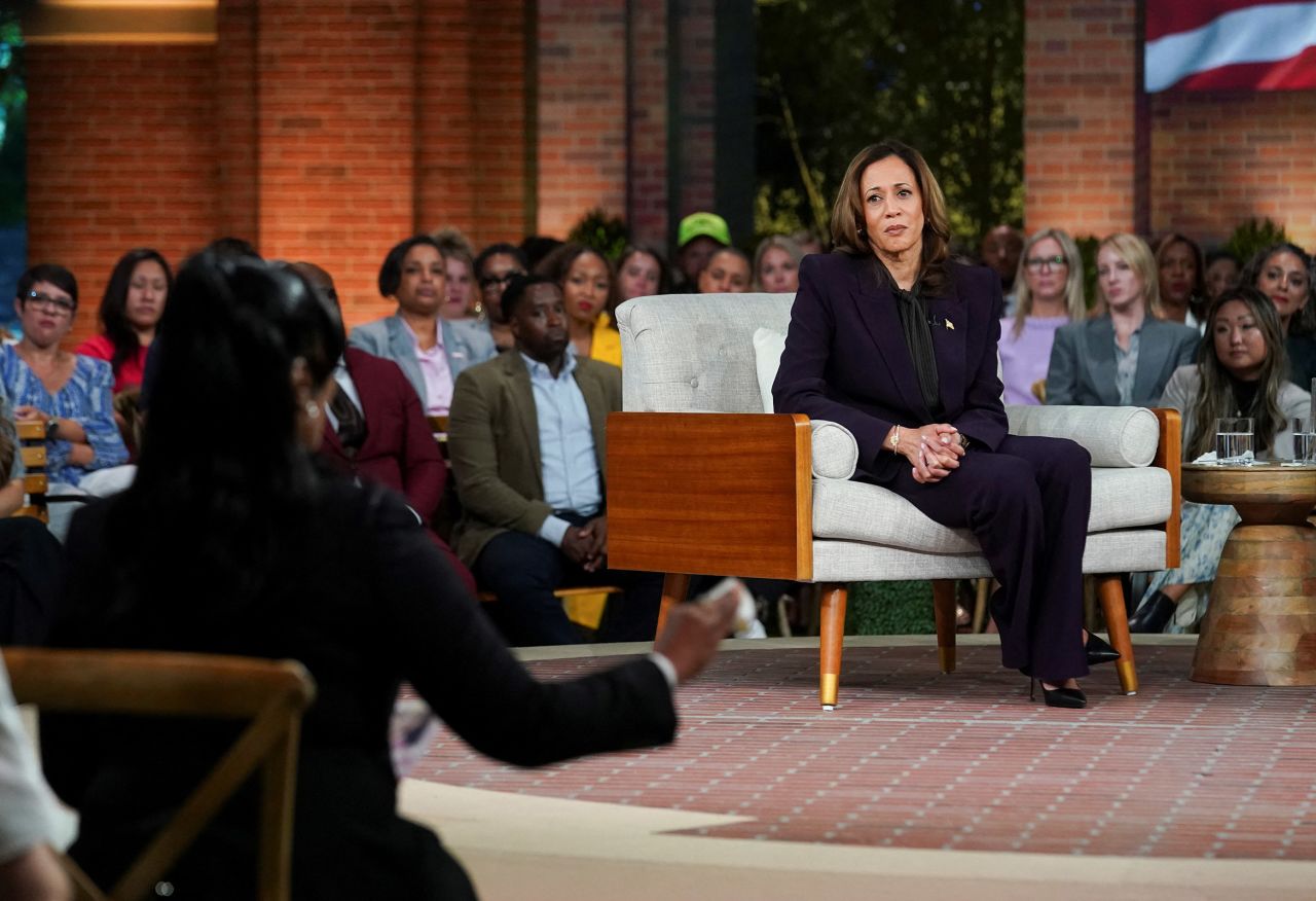 Democratic presidential nominee Vice President Kamala Harris listens to Shanette Williams, mother of Amber Thurman, at a campaign event in Detroit, Michigan, on September 19. 