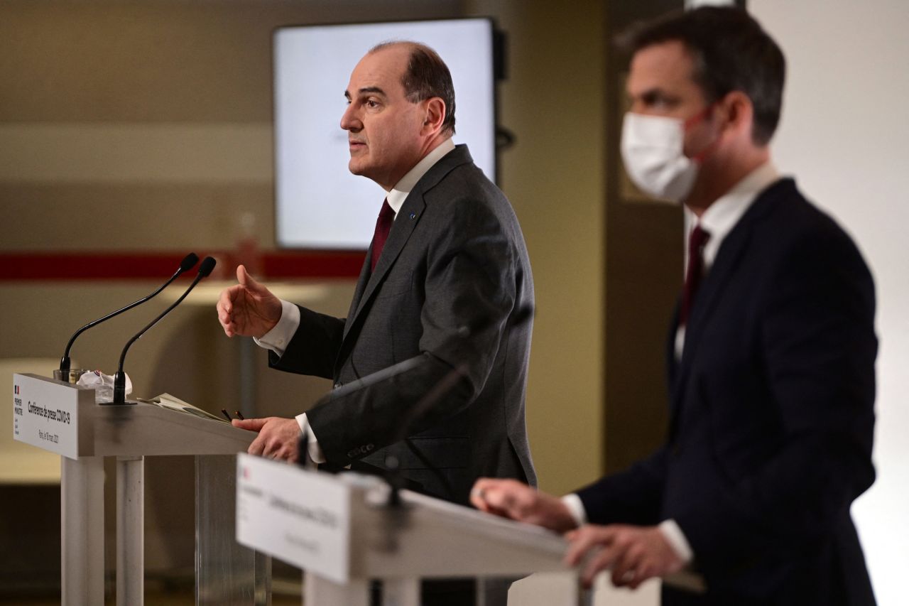 French Prime Minister Jean Castex, left, and French Health Minister Olivier Veran deliver a joint press conference in Paris on March 18.