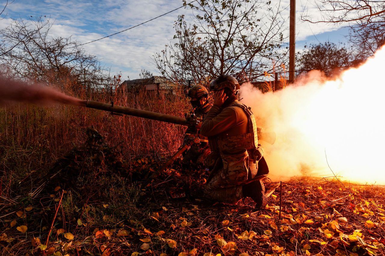 Ukrainian servicemen fire an anti-tank grenade launcher toward Russian troops in Avdiivka on November 8. 