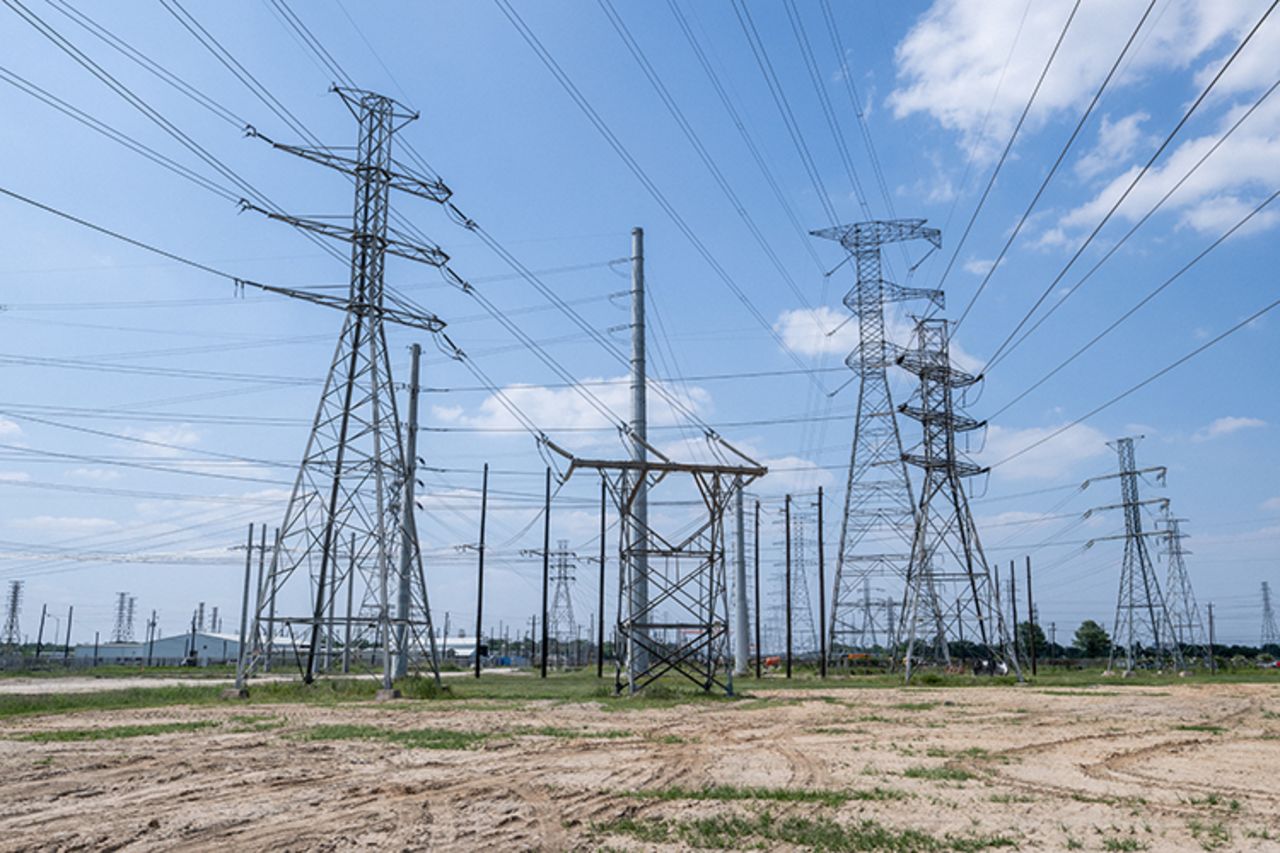 Transmission towers are seen at the CenterPoint Energy power plant on Thursday, June 9, in Houston, Texas. Power demand in Texas is expected to set new all-time highs as heat waves surge to levels rarely seen outside of summer, and economic growth contributes to higher usage in homes and businesses. The Electric Reliability Council of Texas (ERCOT) has said that it has enough resources to meet demand. 