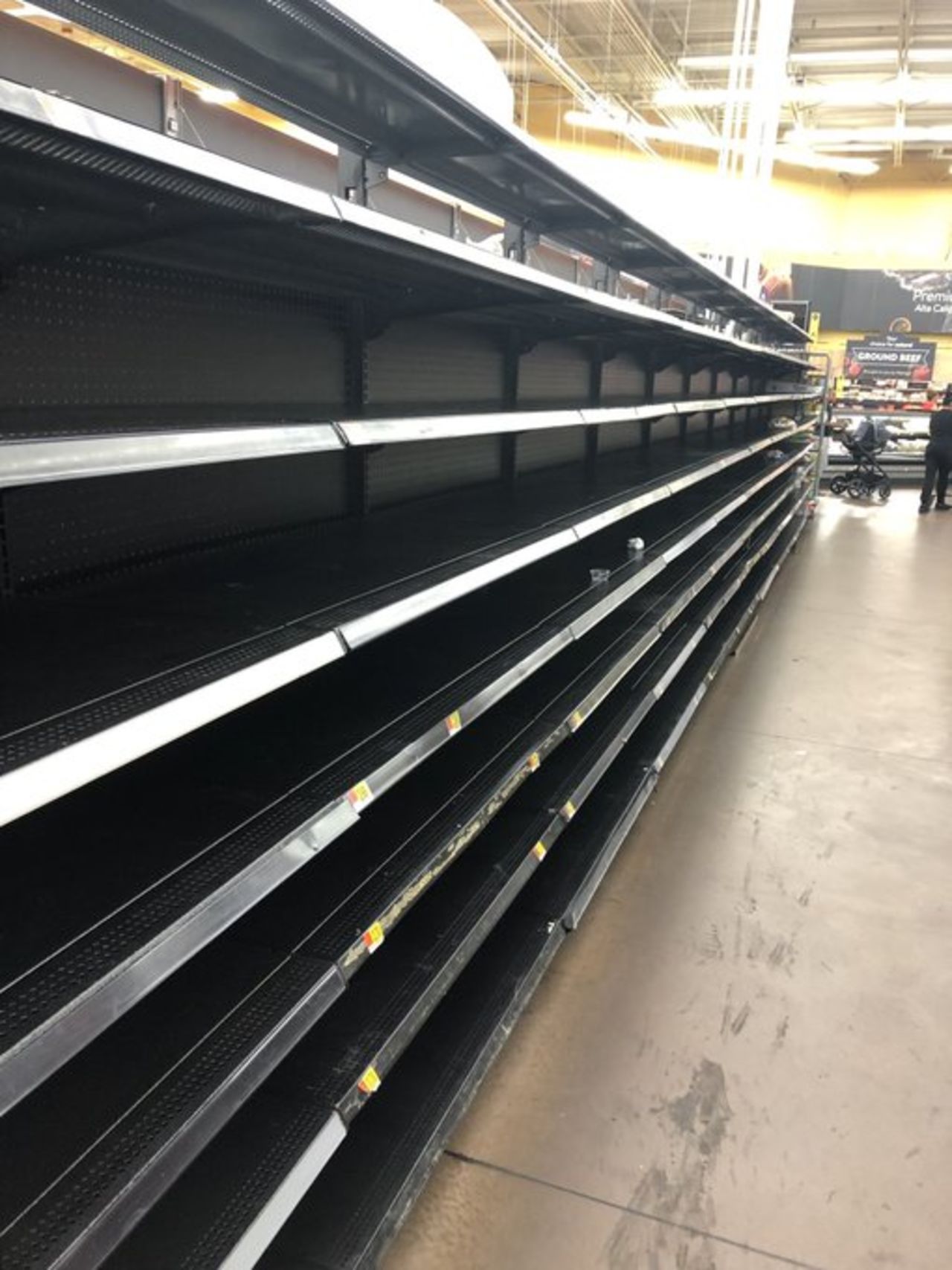 The shelves at Kumwenda's local Walmart have been cleared by residents preparing for the storm.