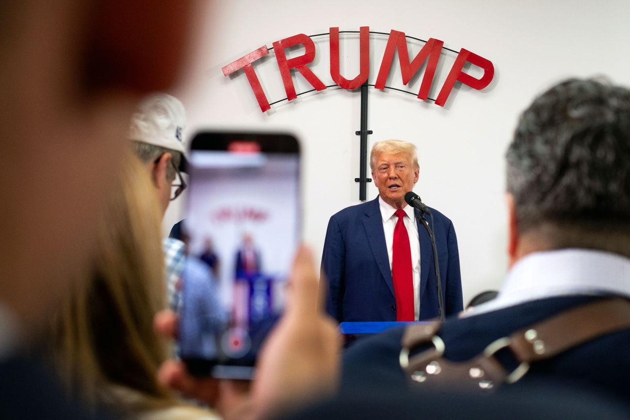 Former President Donald Trump speaks at Trump Force 47 campaign headquarters on August 26 in Roseville, Michigan.