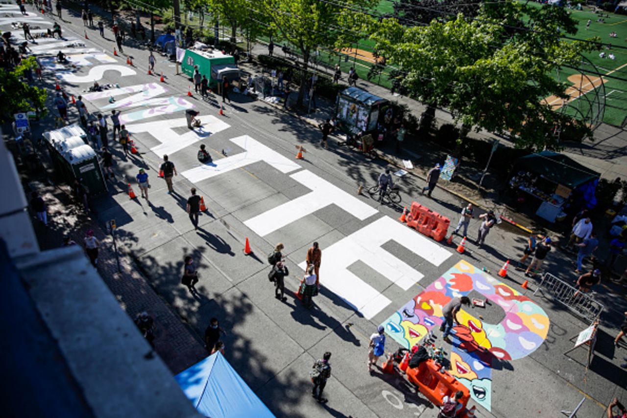 The words "Black Lives Matter" are painted in the middle of East Pine Street in the "Capitol Hill Autonomous Zone" in Seattle on June 11. 