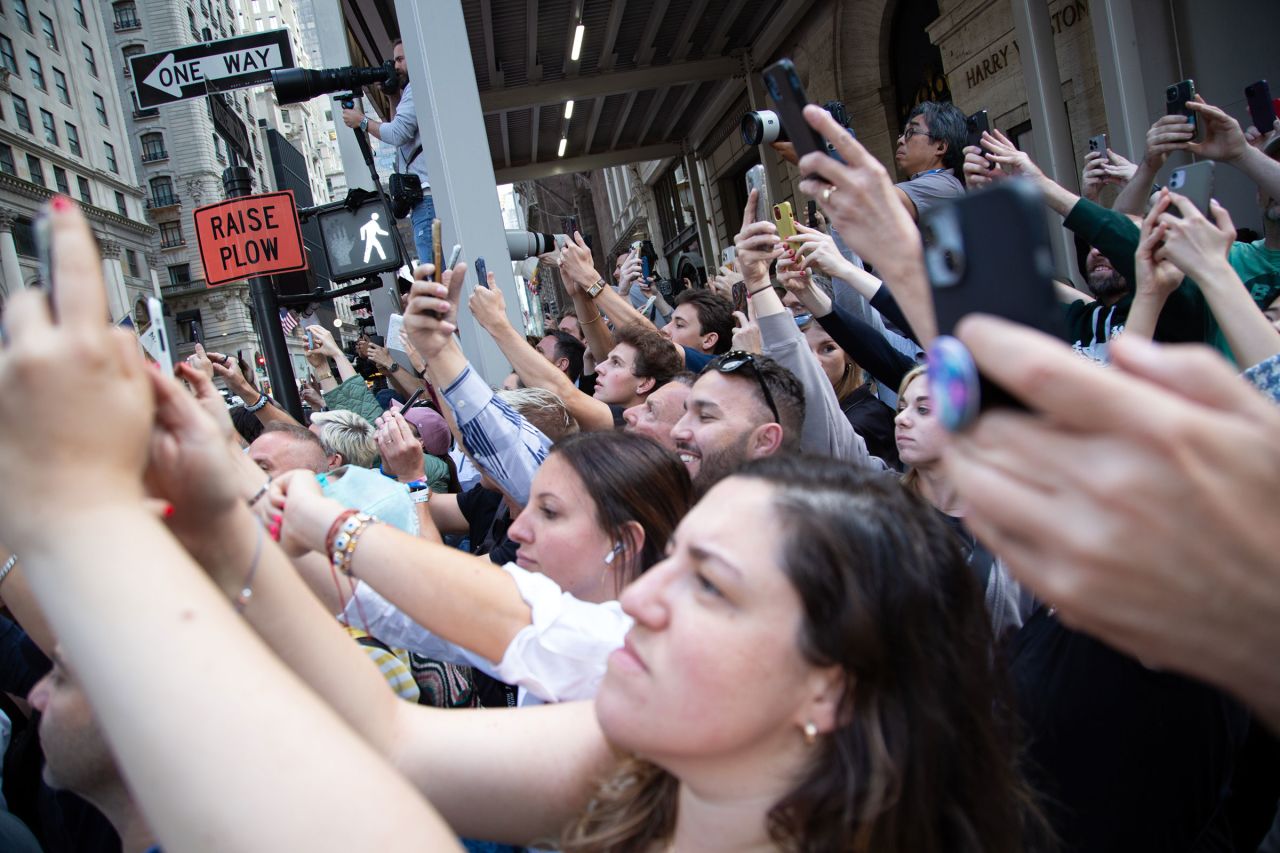 People attempt to photograph Trump as he arrives at Trump Tower in New York City, on May 30.