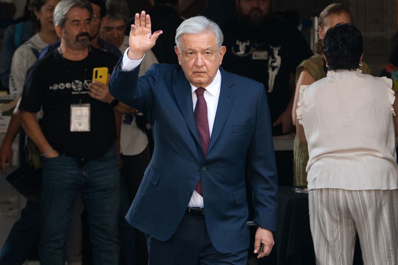 Mexico's President Andres Manuel Lopez Obrador waves after voting during the general election in Mexico City on June 2.