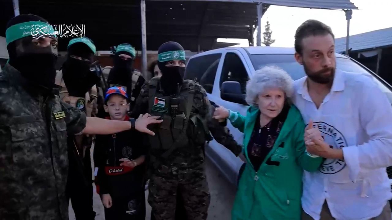 A still from a video released by Hamas on Friday shows Israeli hostages being transferred from unmarked white SUVs into the back of Red Cross vehicles. 